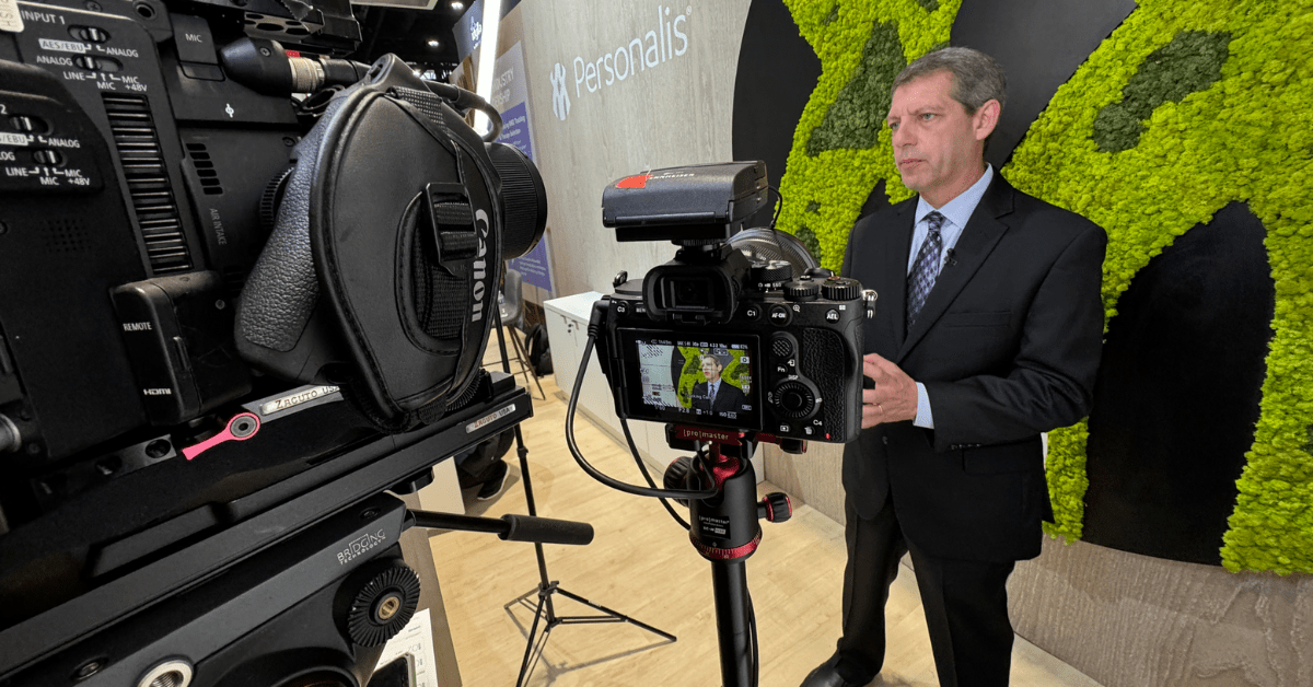 Simplistic Views Camera Crew Filming on the exhibit floor of the McCormick Place in Chicago